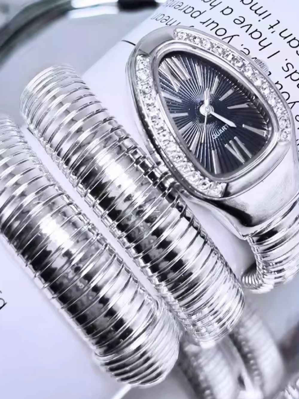 Silver Snake-Style Coil Watch with Black Sunburst Dial